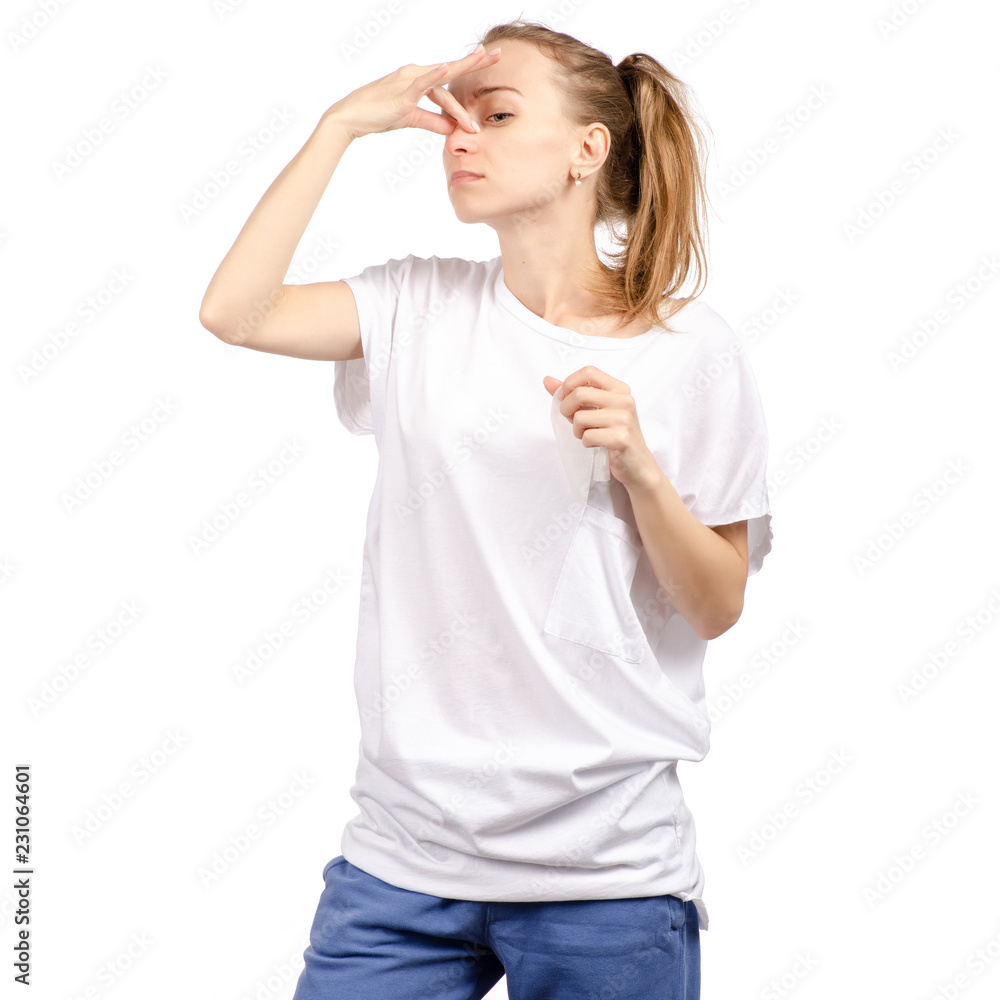 Beautiful woman is sick colds wipes nose on a white background. Isolation Beautiful woman is sick colds wipes nose on a white background. Isolation
