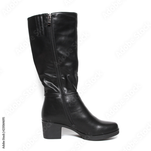 Women's demi-season high boots isolated on white background © GreenStock