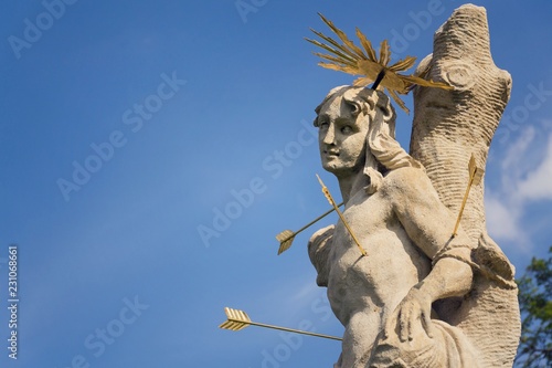Obraz na plátně Saint Sebastian shot with arrows martyr statue, Marian plague column of Saint Ro