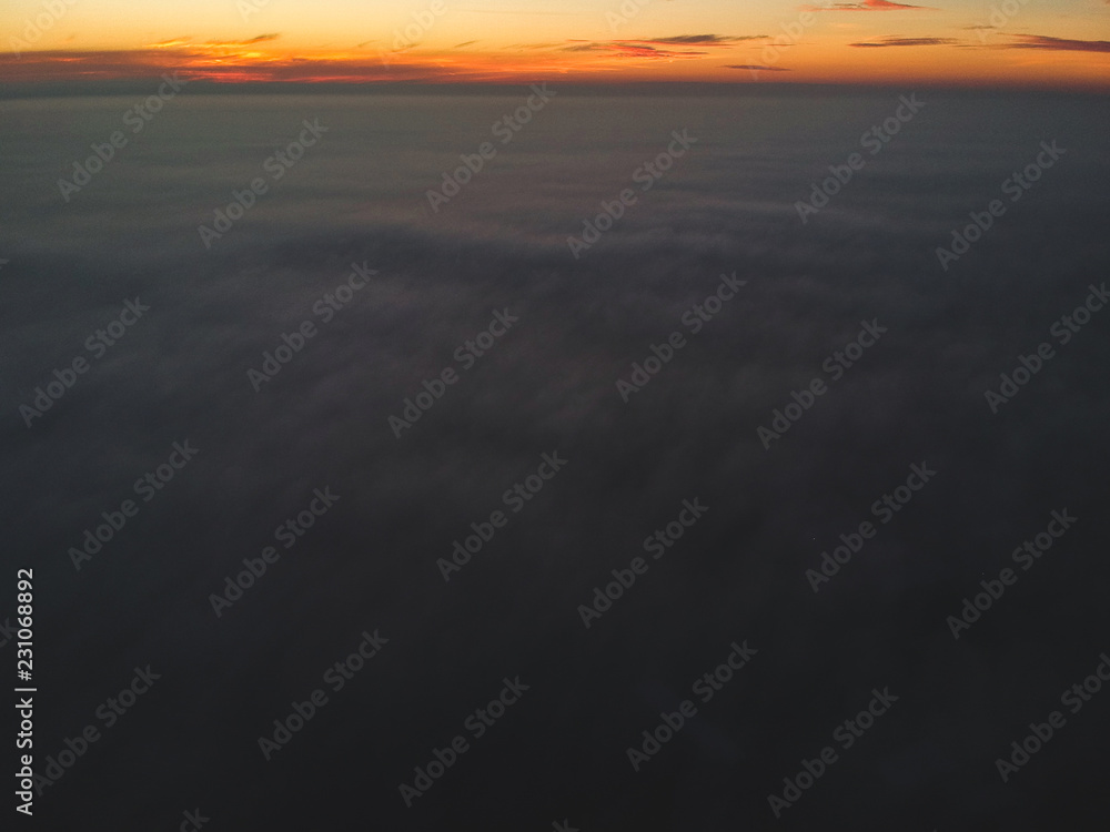 Dawn above clouds