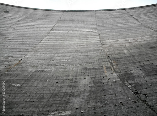 Beauregard Dam, a gravity arc construction, before the partial demolition which reduced the dam from 72 meters height to 20 meters height - Valgrisenche Village, Aosta Valley Province, Italy photo