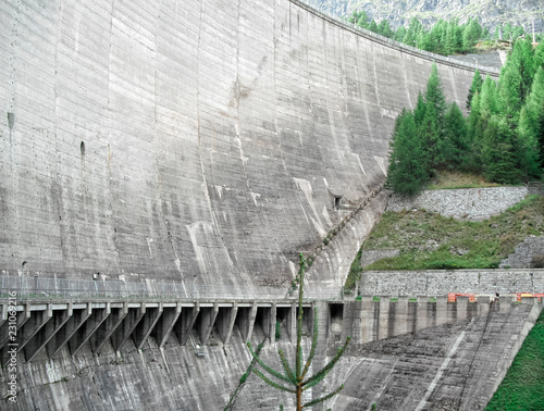 Beauregard Dam, a gravity arc construction, before the partial demolition which reduced the dam from 72 meters height to 20 meters height - Valgrisenche Village, Aosta Valley Province, Italy photo