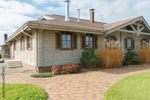 modern restaurant with tile pavement and landscape design