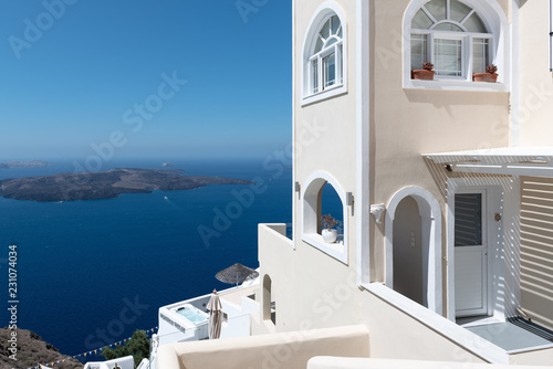 House with panoramic view on volcanic caldera at Santorini island, Greece