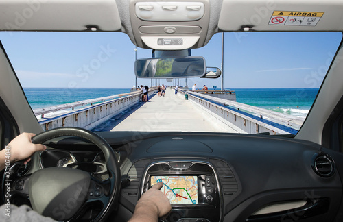 Fototapeta Naklejka Na Ścianę i Meble -  Driving while using GPS towards Venice Beach Pier, California, USA