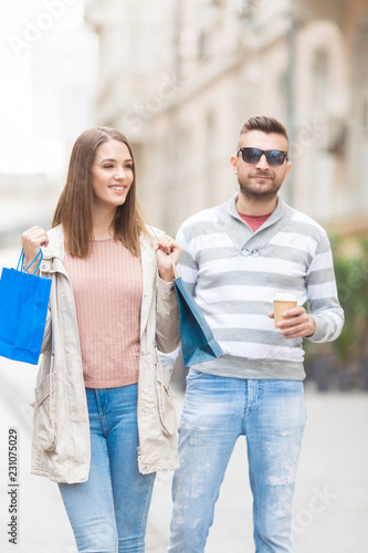 Young couple in shopping outdoors