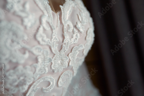 Delicate white laces on wedding dress corset