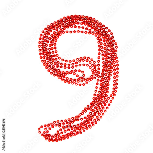 Red bead. Bright number 9. Garlands. Sparkling decor.