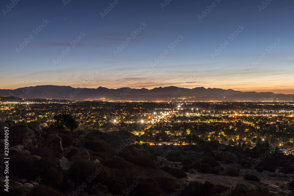 Los Angeles California predawn scenic San Fernando Valley view. The San Gabriel Mountains are in background. Los Angeles California predawn scenic San Fernando Valley view. The San Gabriel Mountains are in background.