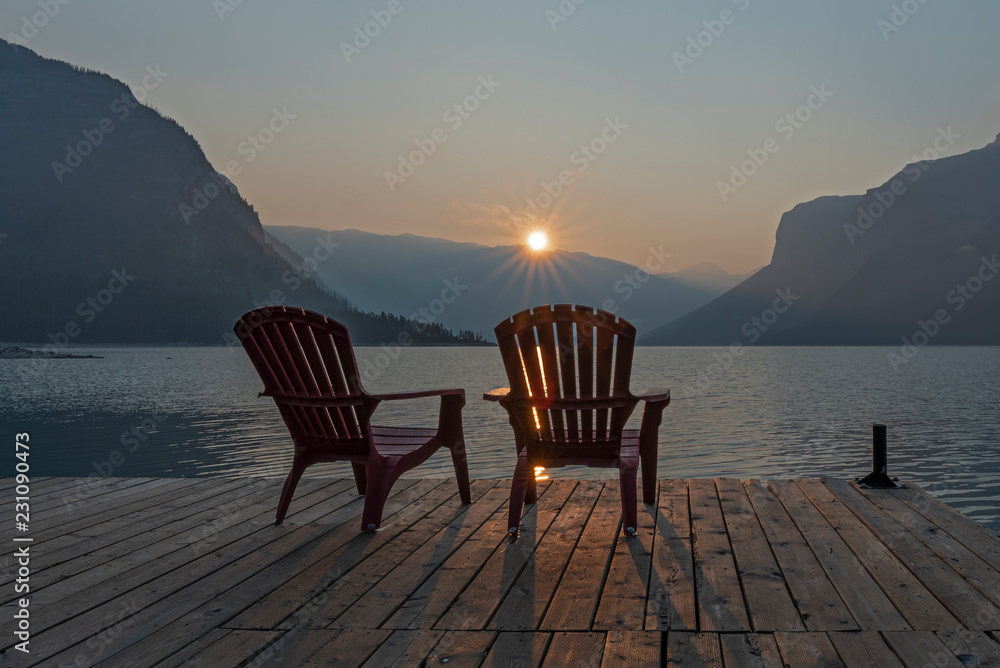 Smoky Sunrise at Lake Minnewanka in Banff National Park Smoky Sunrise at Lake Minnewanka in Banff National Park