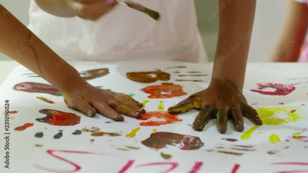 Close up hands of unrecognizable black children of elementary school