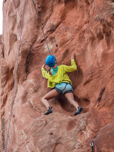 A girl doing rock climbing