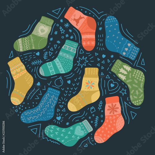 Warm knitted socks with doodles. Vector illustration.