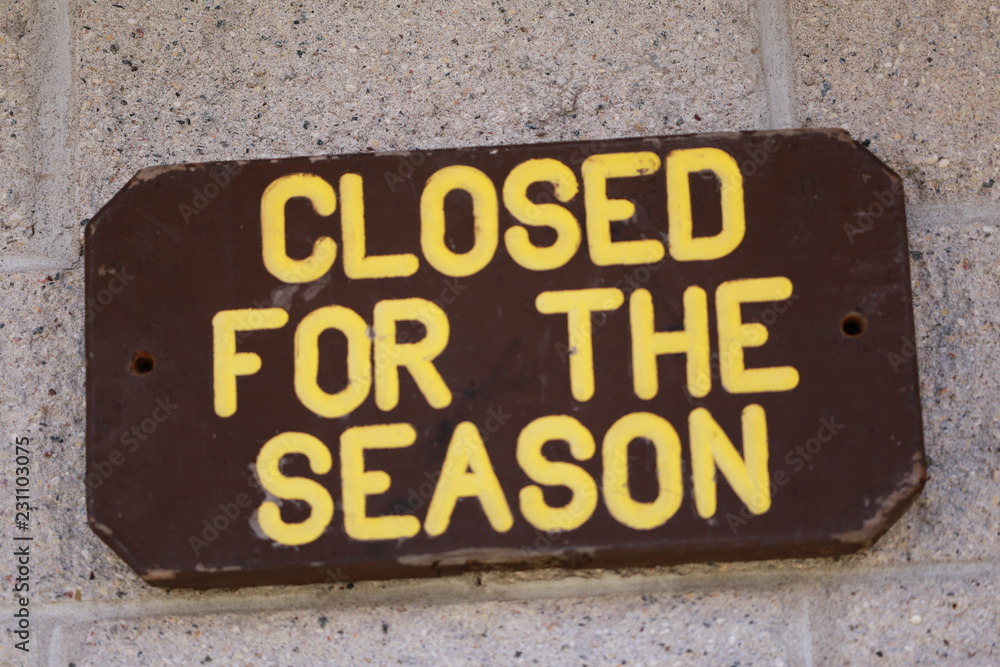 A wooden sign that states A wooden sign that states