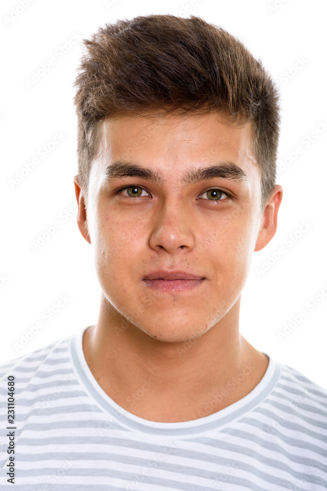Face of young handsome man looking at camera Face of young handsome man looking at camera