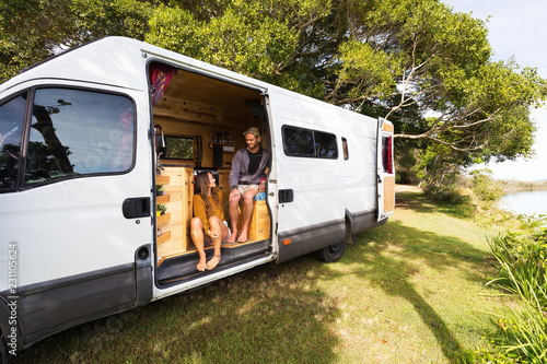 Fototapeta Van life couple in bohemian camper van at a scenic Australian location