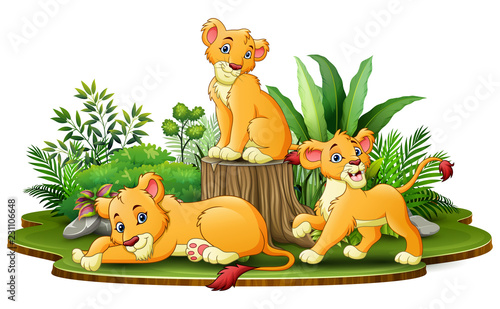 Fototapeta Naklejka Na Ścianę i Meble -  Group of lion cartoon in the park with green plants