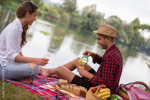 Couple in love enjoying picnic time