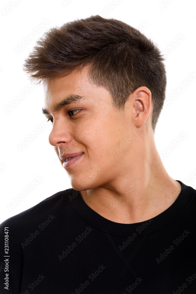 Obraz premium Face of young handsome man looking away