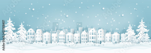 Winter city with houses  buildings and Christmas tree  Christmas card in paper cut style vector illustration