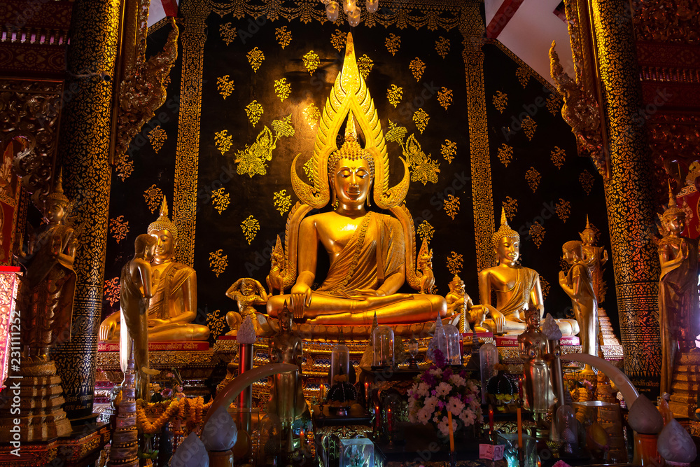 Fototapeta premium Beautiful Buddha Chinnarat Coated with Gold Plate in Thailand temple