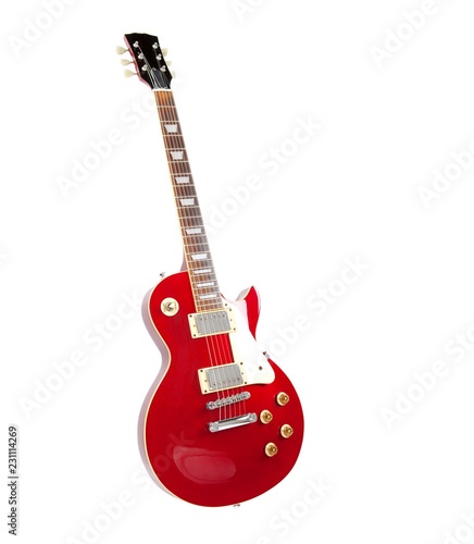 Vintage red electric solid body guitar,standing. Isolated on white.