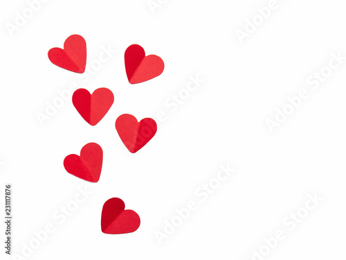 red paper hearts on white background
