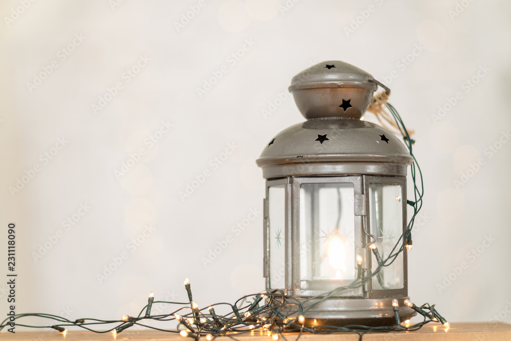 Lantern and light bulb gurland closeup