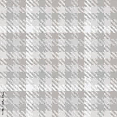 Seamless plaid pattern in tints of pale grey. 