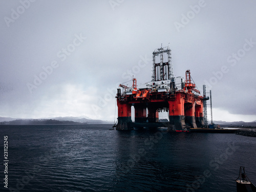 Massive oil rig platform in Norway fjords.
