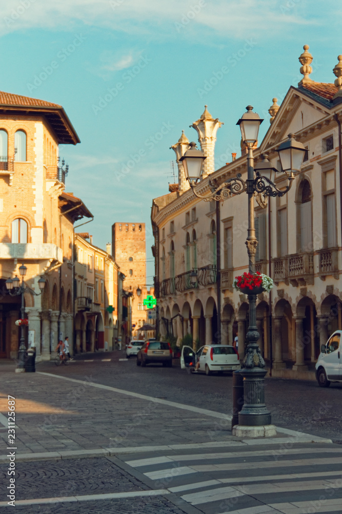 Montagnana, Italy August 6, 2018: Beautiful city street with parked cars.
