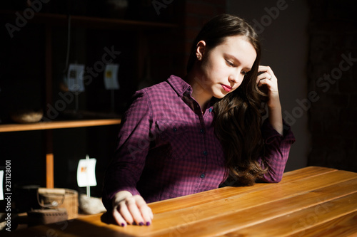 girl sitting at the table