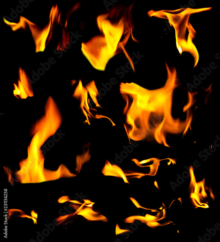 Set of fire flame isolated on a black background texture