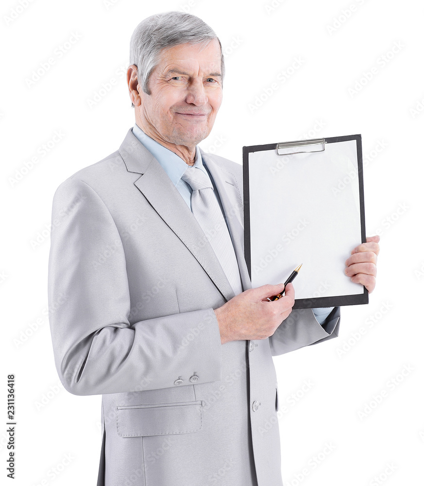 Mature businessman pointing at blank sheet.isolated on a white Mature businessman pointing at blank sheet.isolated on a white