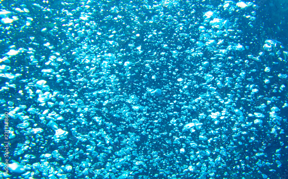 Seawater bubbles background. Sea water bubbles view from undewater. Oxygen in seawater. Condensator aeration bubbles. Seawater bubbles background. Sea water bubbles view from undewater. Oxygen in seawater. Condensator aeration bubbles.