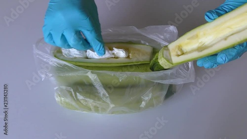 Drug dealer, smuggler, concealing illegal drugs against Policeman, customs and border control in Zucchini