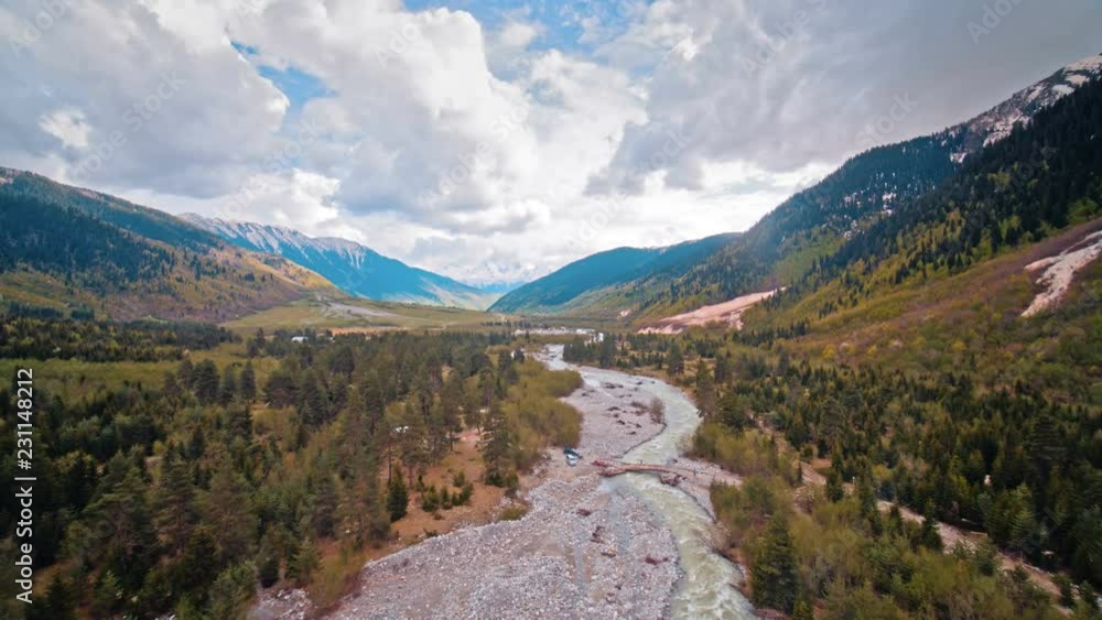 Cold mountain river with raging stream Cold mountain river with raging stream