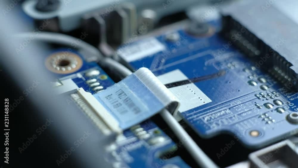 Computer Service. The serviceman cleans the interior of the laptop with dust and other dirt. 4k. Macro footage. Computer Service. The serviceman cleans the interior of the laptop with dust and other dirt. 4k. Macro footage.