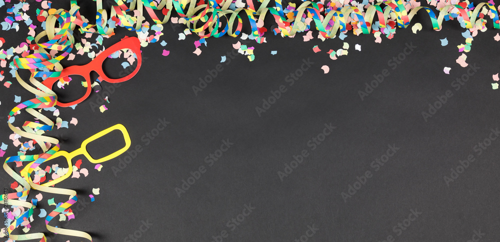 frame with confetti and streamer with black background frame with confetti and streamer with black background