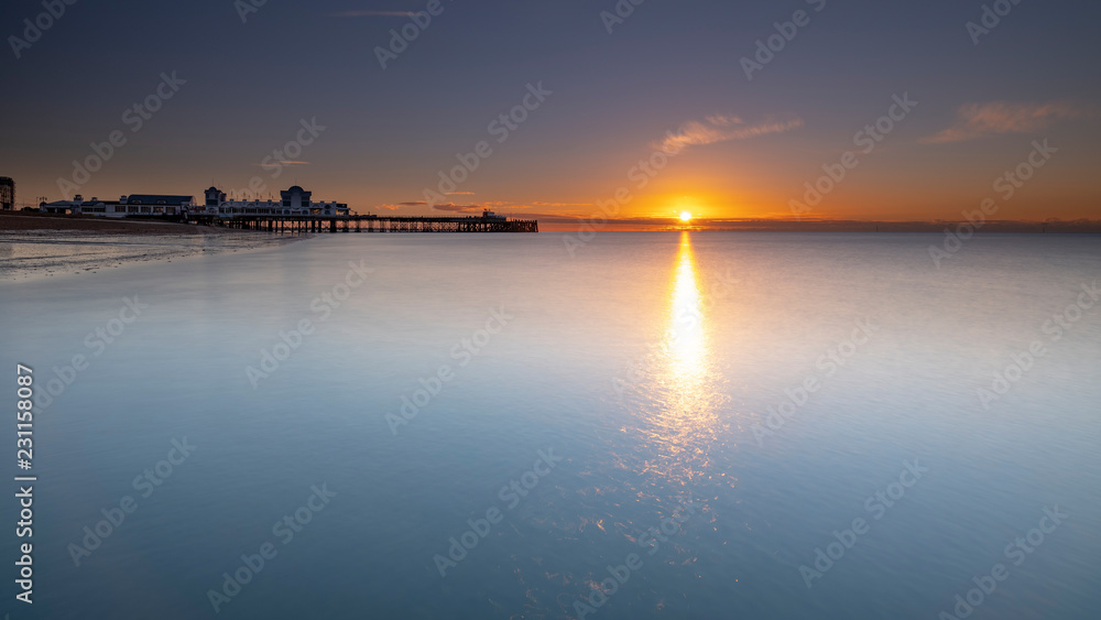 Autumn sunrise over Southsea Pier, Portsmouth, Hampshire, UK