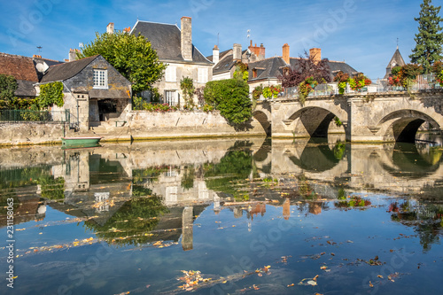 View on old bridge in a small historic French town in Loire Valley.