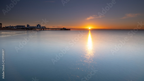 Autumn sunrise over Southsea Pier, Portsmouth, Hampshire, UK