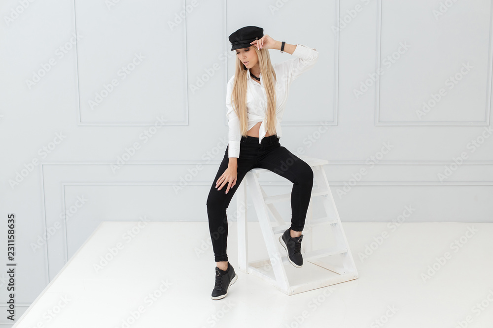 Obraz premium Fashion portrait of women in black and white suit