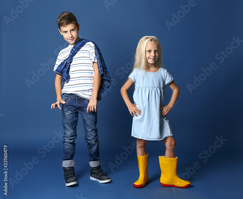 Cute boy and girl in fashio...