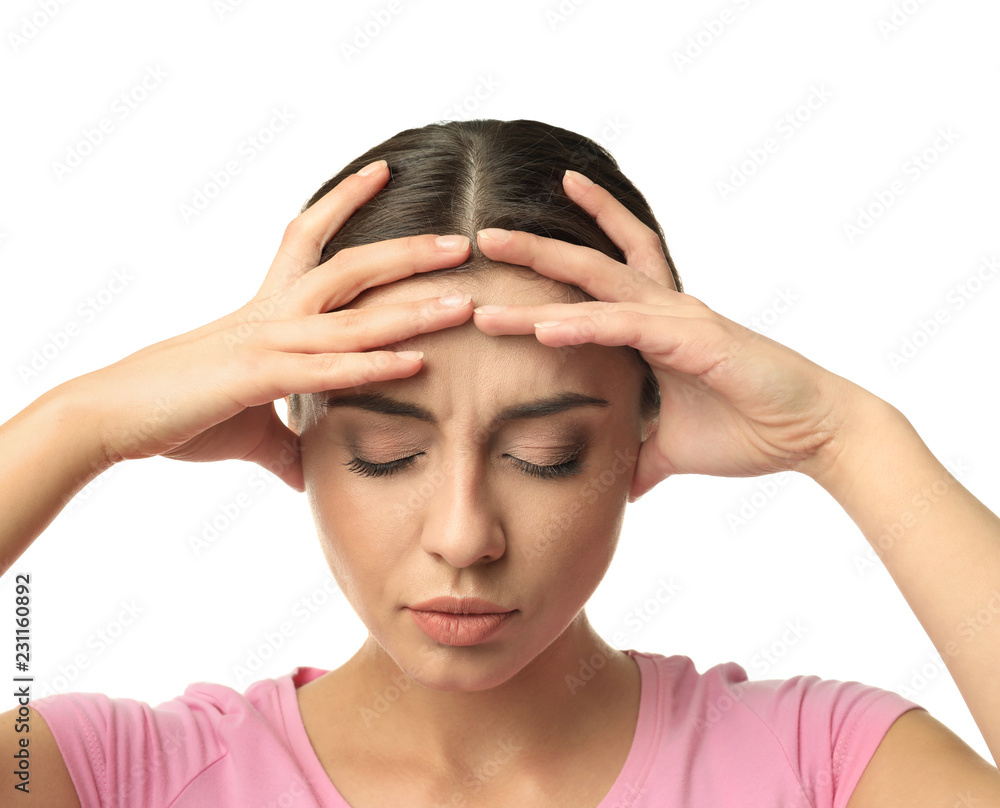 Woman suffering from headache on white background