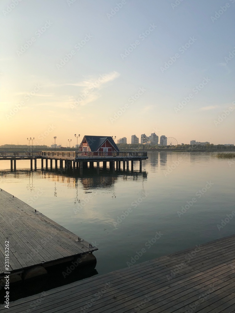 Fototapeta premium wooden pier at sunset