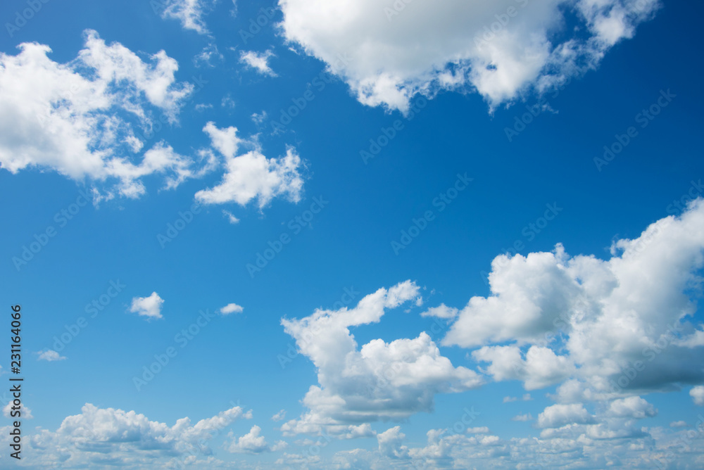 White clouds in blue sky.