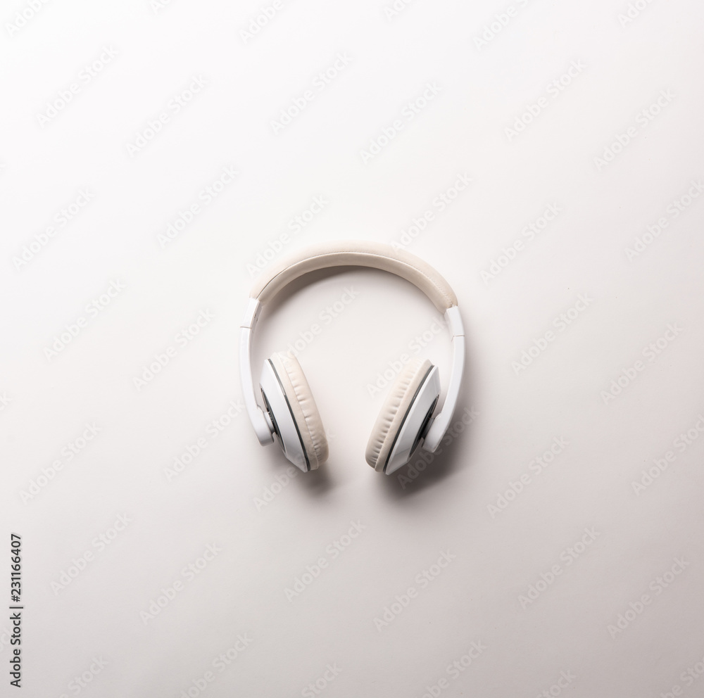 view from above of headphones isolated on white, minimalistic concept view from above of headphones isolated on white, minimalistic concept