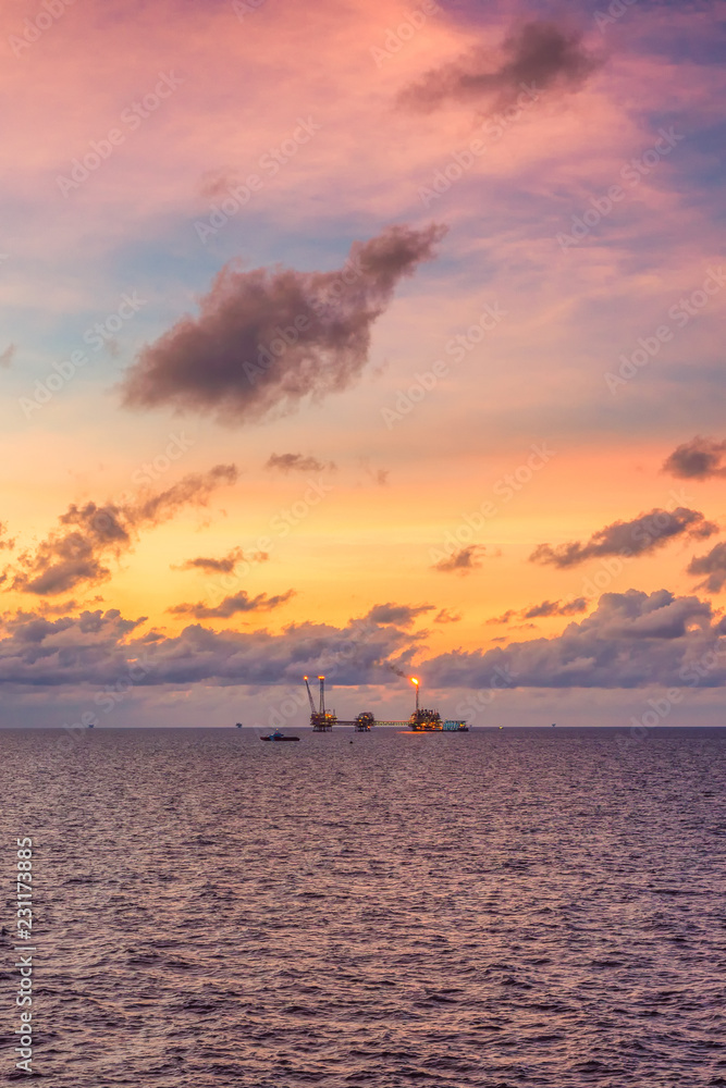 The Oil and Gas Production Platform with the morning sky in Gulf of Thailand The Oil and Gas Production Platform with the morning sky in Gulf of Thailand