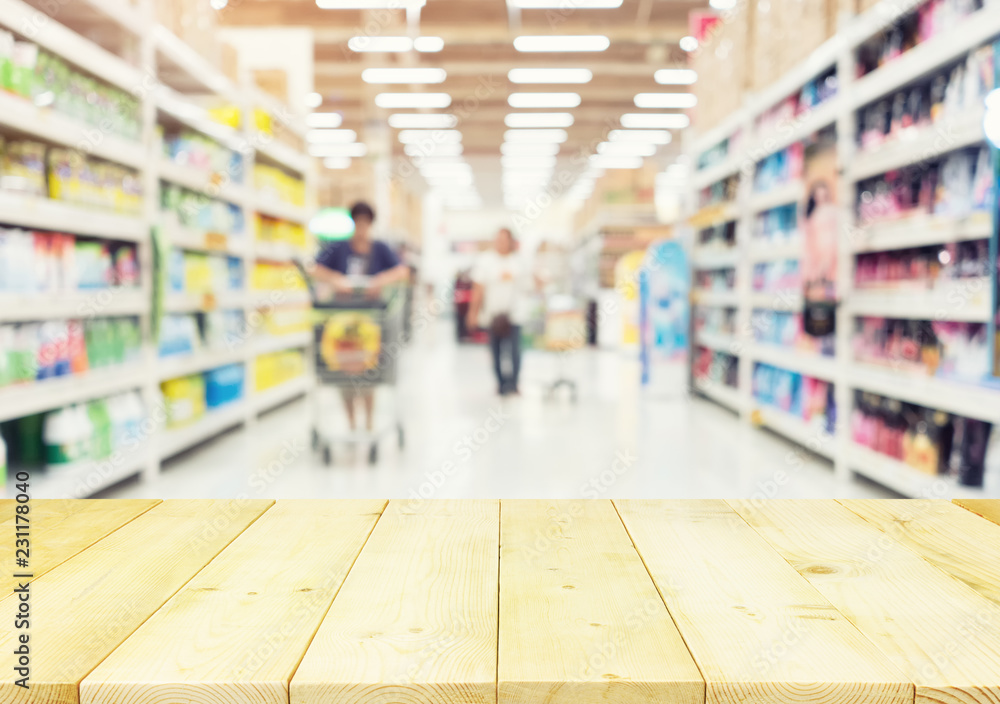 Supermarket or retail store blur background. That is a self-service shop offer grocery and variety of food, beverage and household product on shelf or rack. For shopping background or product display.